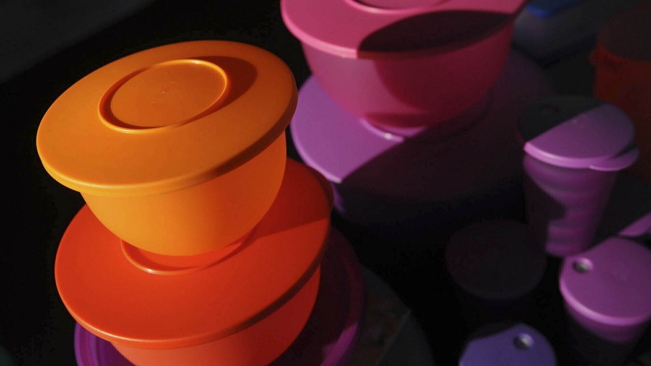 Colorful Tupperware products are seen in Bellflower, Calif. on Aug. 5, 2011. (AP Photo/Garrett Cheen)