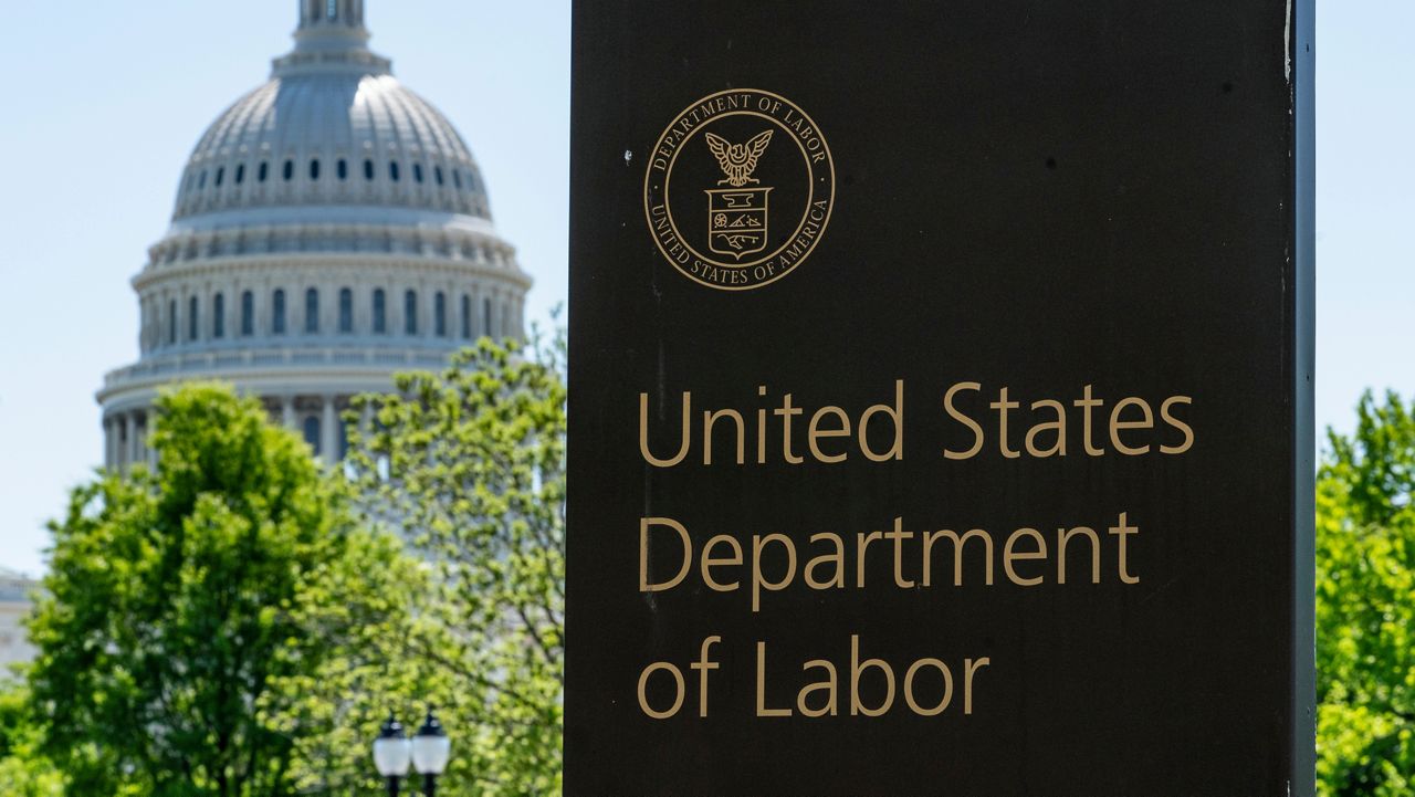 The entrance to the Labor Department is seen near the Capitol in Washington, Thursday, May 7, 2020. (AP Photo/J. Scott Applewhite, File)