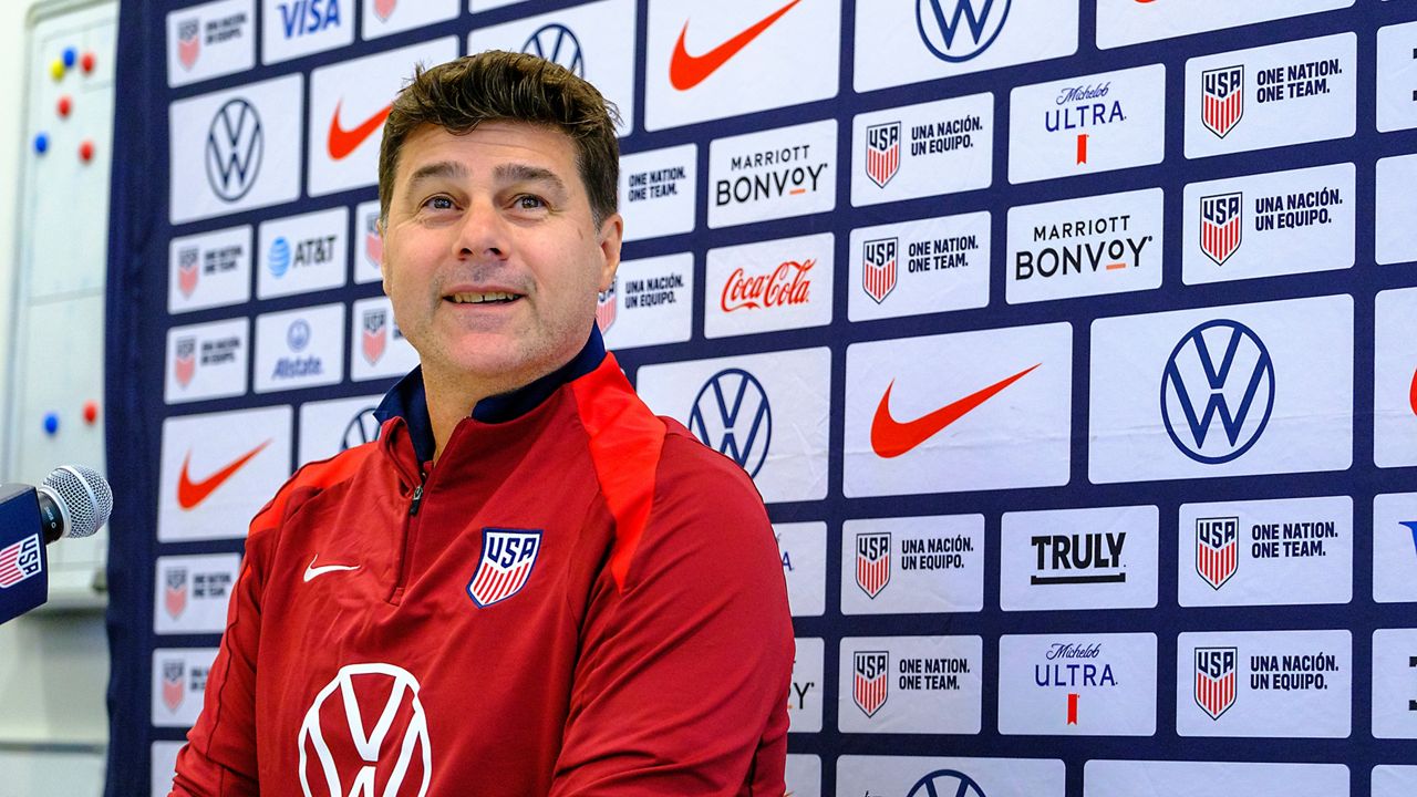 United States head coach, Mauricio Pochettino, takes a seat before speaking to the media, Friday, Oct. 11, 2024, in Austin, Texas, as the U.S. national men's soccer team prepares play Panama in an international friendly on Saturday. (AP Photo/Rodolfo Gonzalez)