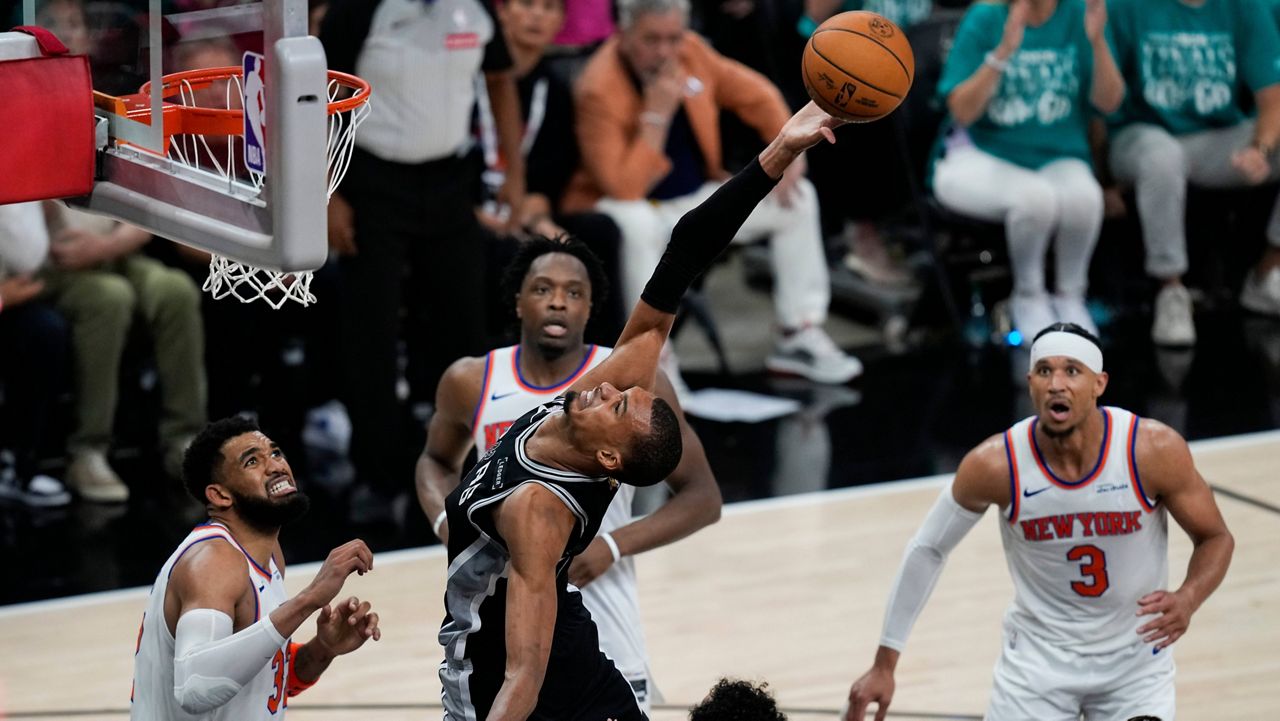 Rain or shine, Spurs fans wait hours for perfect seat to watch Game 2