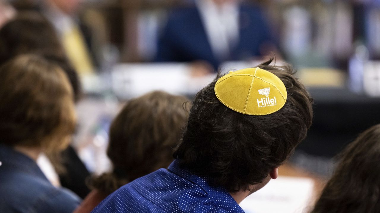 Samuel Winkler wears a Hillel kippah during a visit by Education Secretary Miguel Cardona to Towson University to discuss antisemitism on college campuses, Nov. 2, 2023, in Towson, Md. (AP Photo/Julia Nikhinson)