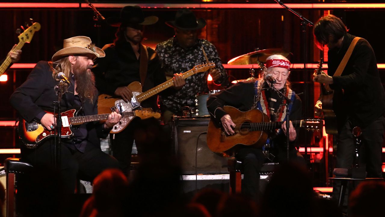 Chris Stapleton, left, and Willie Nelson perform during the Rock & Roll Hall of Fame Induction Ceremony on Friday, Nov. 3, 2023, at Barclays Center in New York. (Photo by Andy Kropa/Invision/AP)