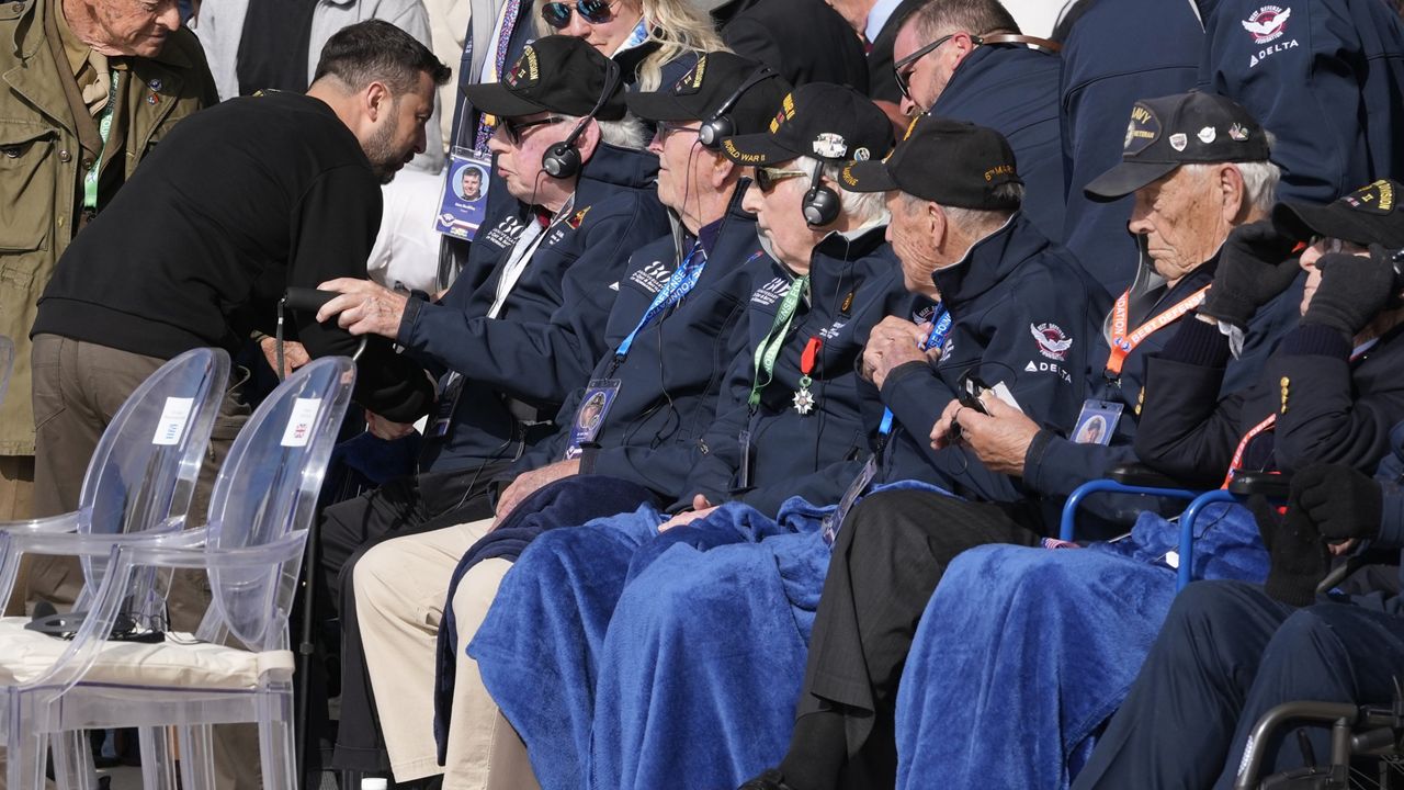 American veteran hugs Ukraine's Zelenskyy at D-Day ceremony