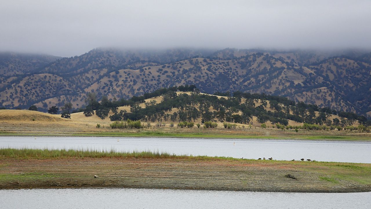 Lake Berryessa is seen with parts of California's newest national monument in the background, July 10, 2015, near Berryessa Snow Mountain National Monument, Calif. (AP Photo/Eric Risberg)