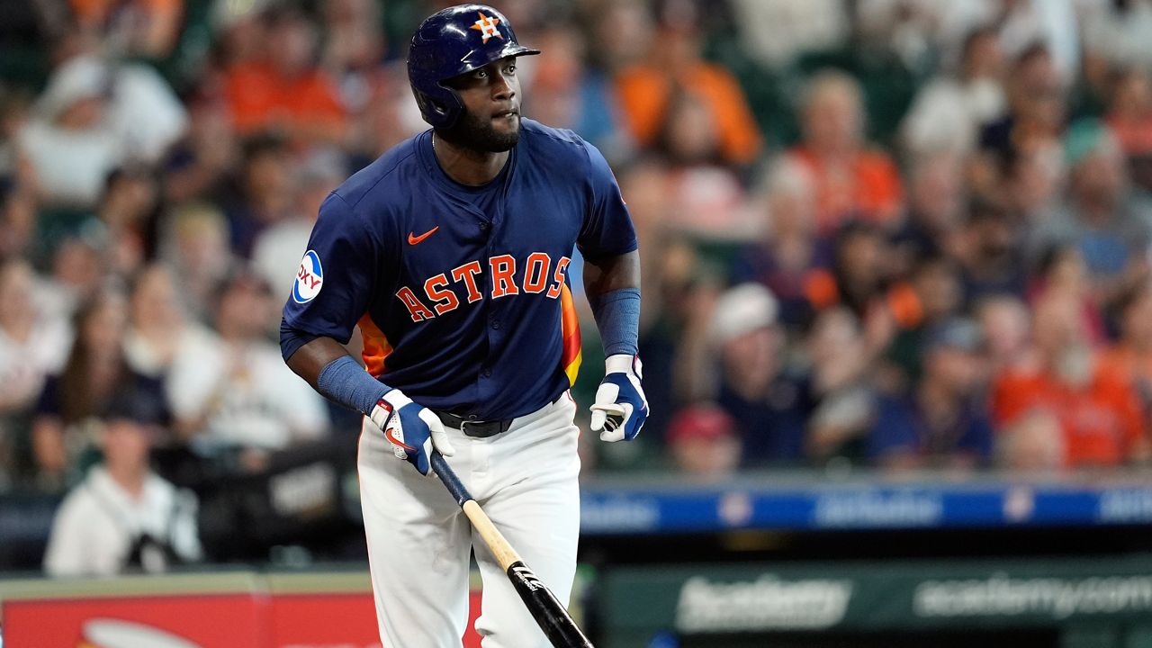 Houston Astros' Yordan Alvarez watches his home run against the Minnesota Twins during the fifth inning of a baseball game Saturday, June 1, 2024, in Houston. (AP Photo/David J. Phillip)