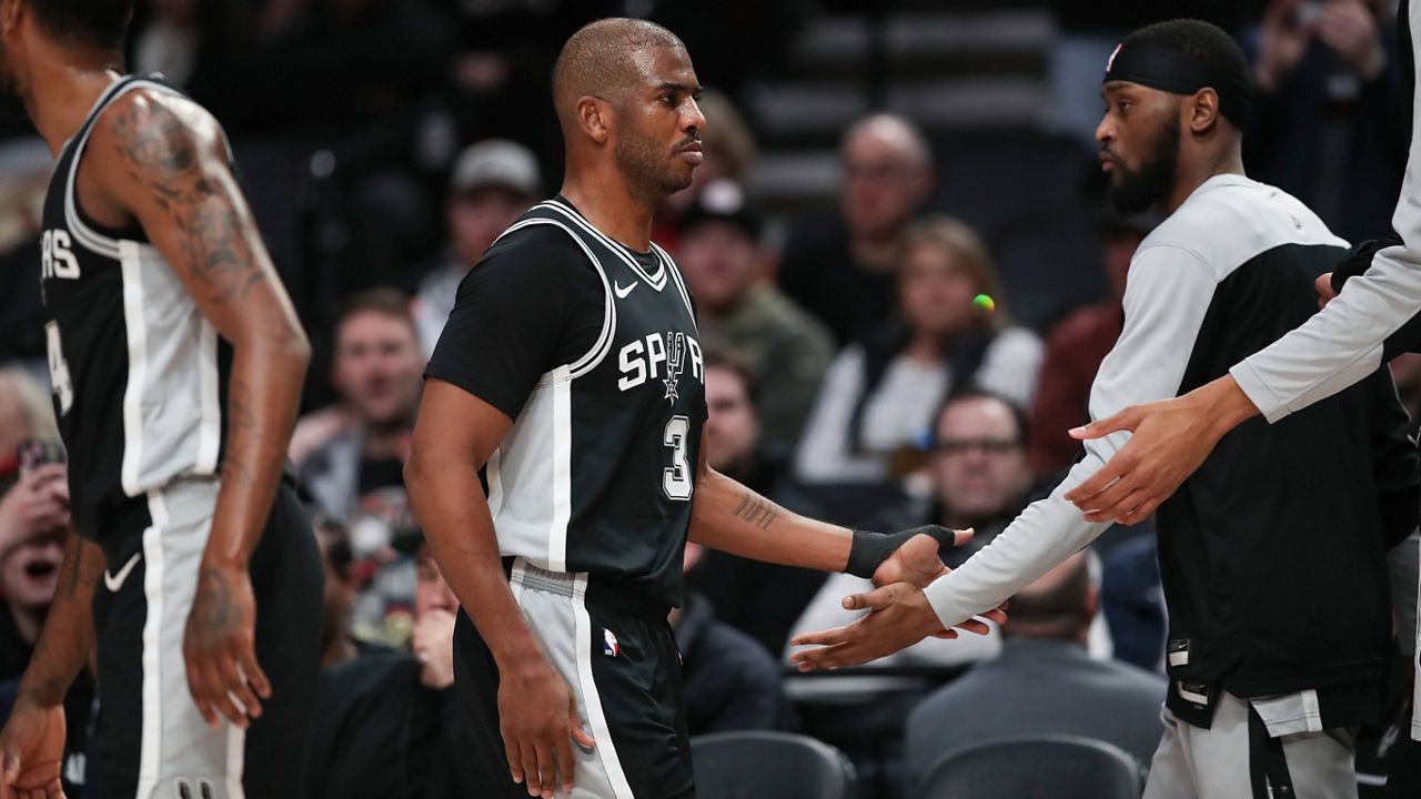 San Antonio Spurs guard Chris Paul (3) walks off the court after being ejected during the first half of an NBA basketball game against the Portland Trail Blazers Friday, Dec. 13, 2024, in Portland, Ore. (AP Photo/Amanda Loman)