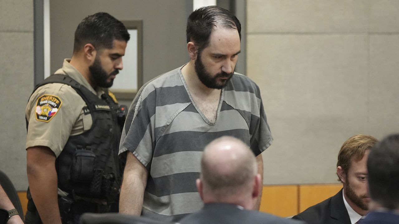 Daniel Perry enters the courtroom at the Blackwell-Thurman Criminal Justice Center, May 10, 2023, in Austin, Texas. (Jay Janner/Austin American-Statesman via AP)