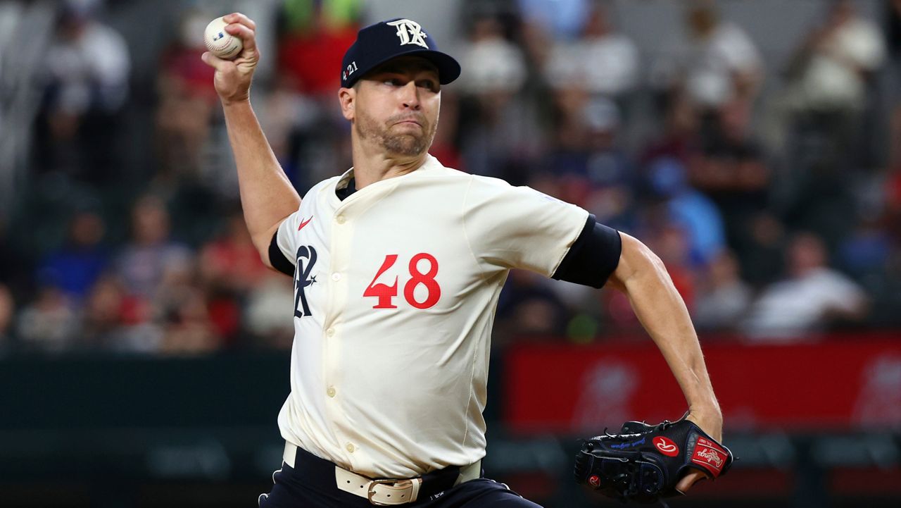 Texas Rangers starting pitcher Jacob deGrom (48) delivers in the first inning of a baseball game against the Seattle Mariners, Friday, Sept. 20, 2024, in Arlington, Texas. (AP Photo/Richard W. Rodriguez)