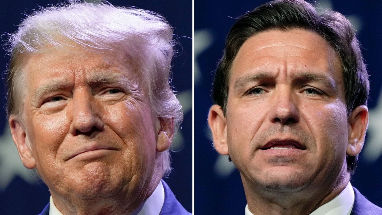 This combination of photos shows Republican presidential candidates former President Donald Trump, left, and Florida Gov. Ron DeSantis at the Republican Party of Iowa's 2023 Lincoln Dinner in Des Moines, Iowa, July 28, 2023. (AP Photo/Charlie Neibergall)