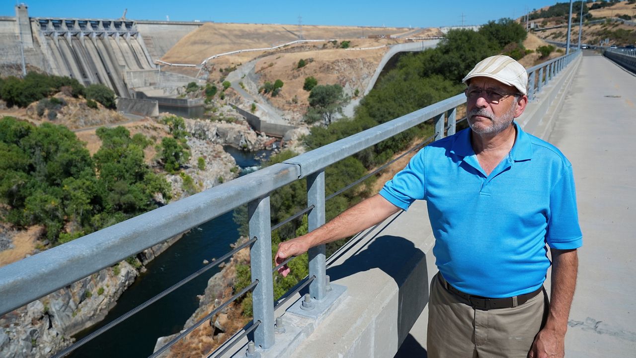 George Booth, executive director of the Floodplain Management Association, is photographed in front of Folsom Dam, Friday, Aug. 16, 2024, in Folsom, Calif. (AP Photo/Godofredo A. Vásquez)