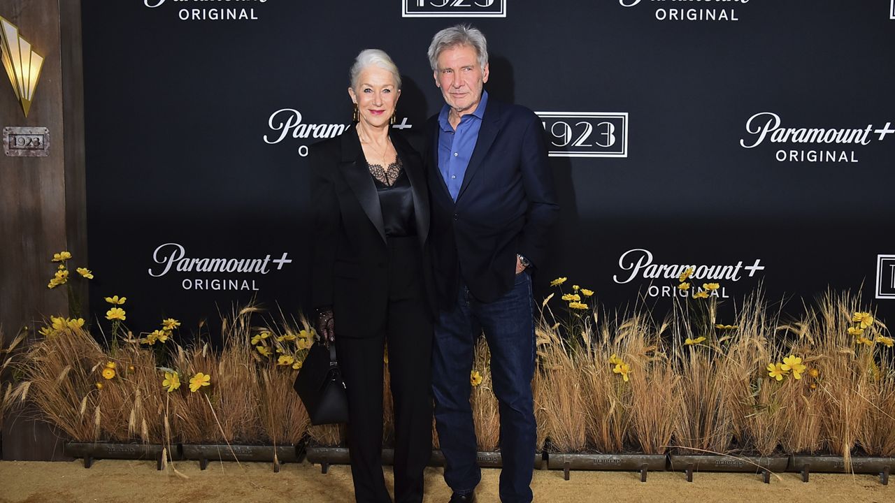 Helen Mirren, left, and Harrison Ford arrive at the Los Angeles premiere of "1923," Friday, Dec. 2, 2022, at Hollywood American Legion Post 43. (Photo by Jordan Strauss/Invision/AP)