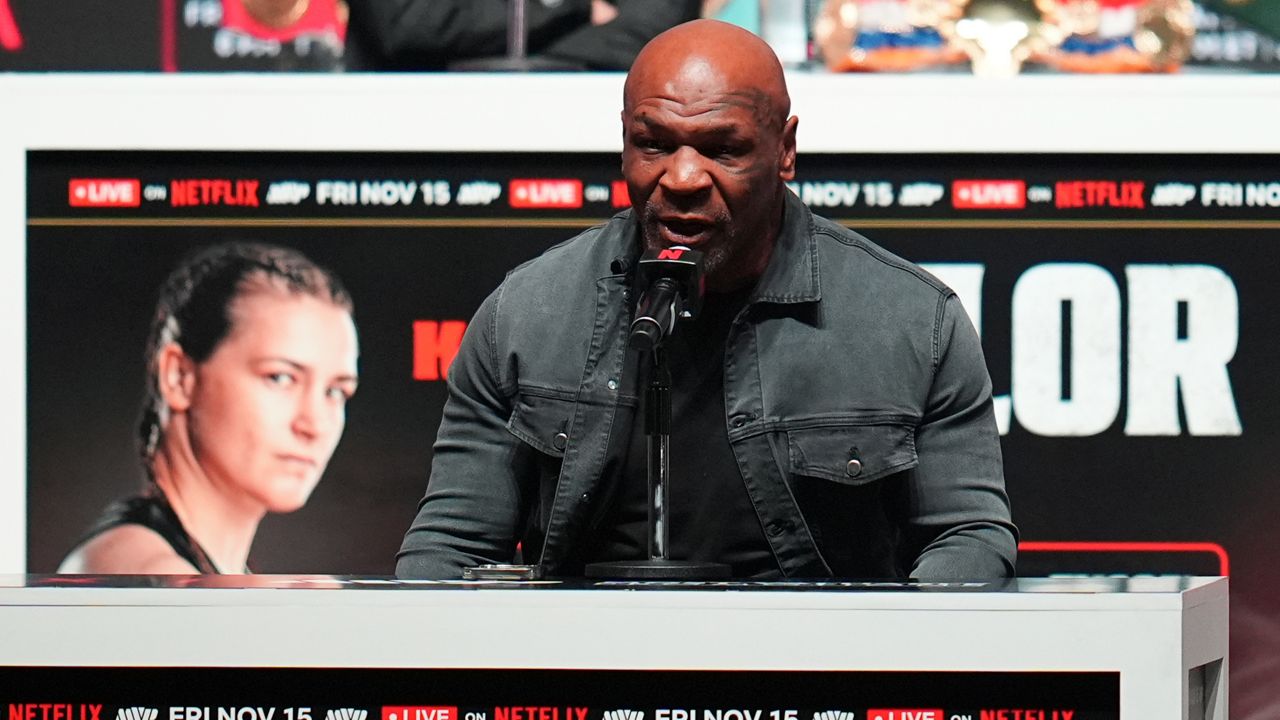 Mike Tyson speaks during a news conference ahead of his fight against Jake Paul, Wednesday, Nov. 13, 2024, in Irving, Texas. (AP Photo/Julio Cortez)