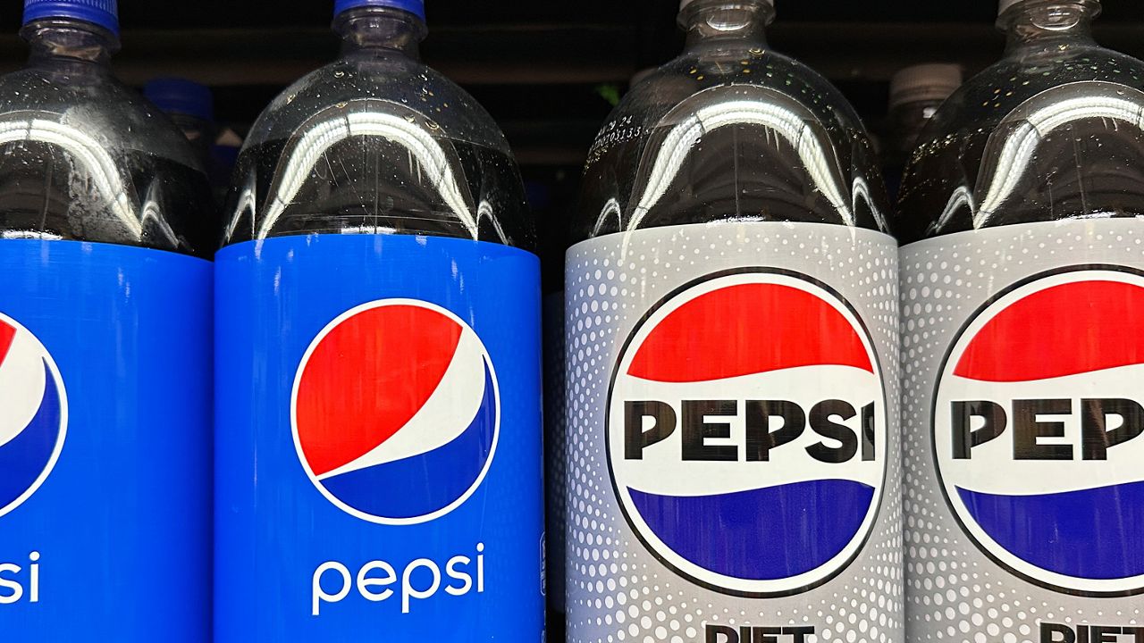 Plastic bottles of Pepsi are displayed at a grocery store in New York on Nov. 15, 2023. Before inflation began heating up, a 2-liter bottle of soda it cost an average of $1.67 in supermarkets across America. Three years later it is going for $2.25, a 35% increase. (AP Photo/Ted Shaffrey, File)