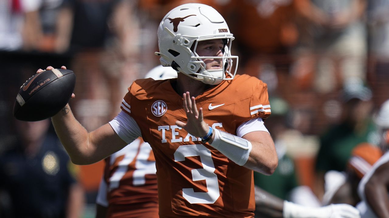 Texas quarterback Quinn Ewers (3) looks to pass against Colorado State during the first half of an NCAA college football game in Austin, Texas, Saturday, Aug. 31, 2024. (AP Photo/Eric Gay)