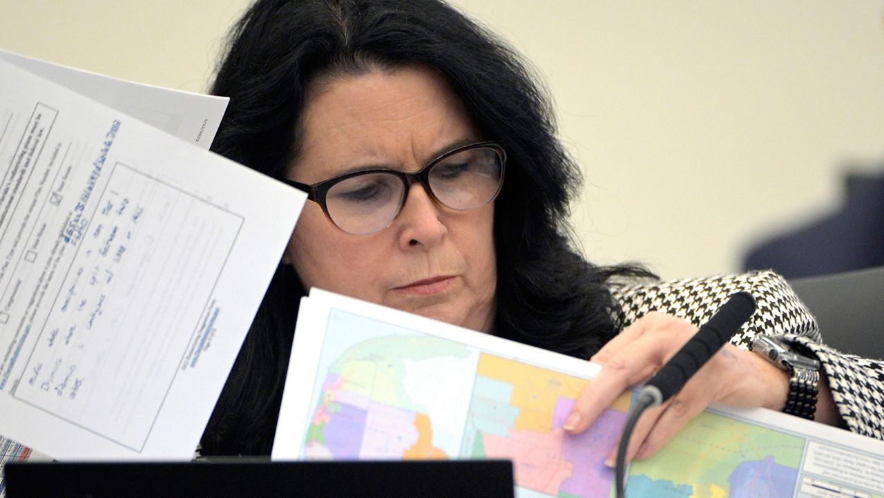 State Sen. Kelli Stargel looks through redistricting maps during a Senate Committee on Reapportionment hearing on Jan. 13, 2022, in Tallahassee, Fla. (AP Photo/Phelan M. Ebenhack, File)