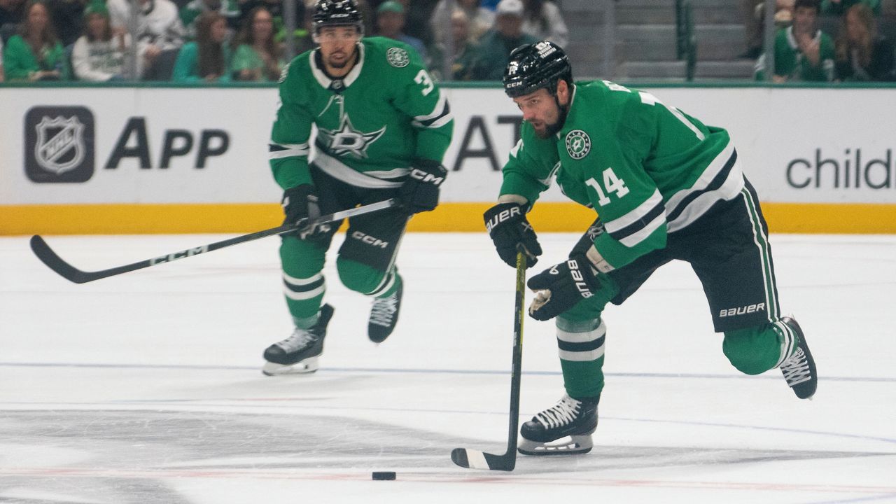 Dallas Stars left wing Jamie Benn (14) gains possession of the puck during the first period of an NHL hockey game against the Chicago Blackhawks, Saturday, Oct. 26, 2024, in Dallas. (AP Photo/Emil T. Lippe)