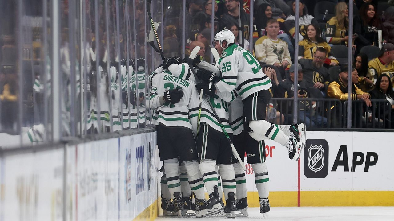 Dallas Stars center Matt Duchene (95) celebrates with teammates after a game winning goal by center Wyatt Johnston (53) during overtime against the Vegas Golden Knights in Game 3 of an NHL hockey Stanley Cup first-round playoff series Saturday, April 27, 2024, in Las Vegas. (AP Photo/Ian Maule)