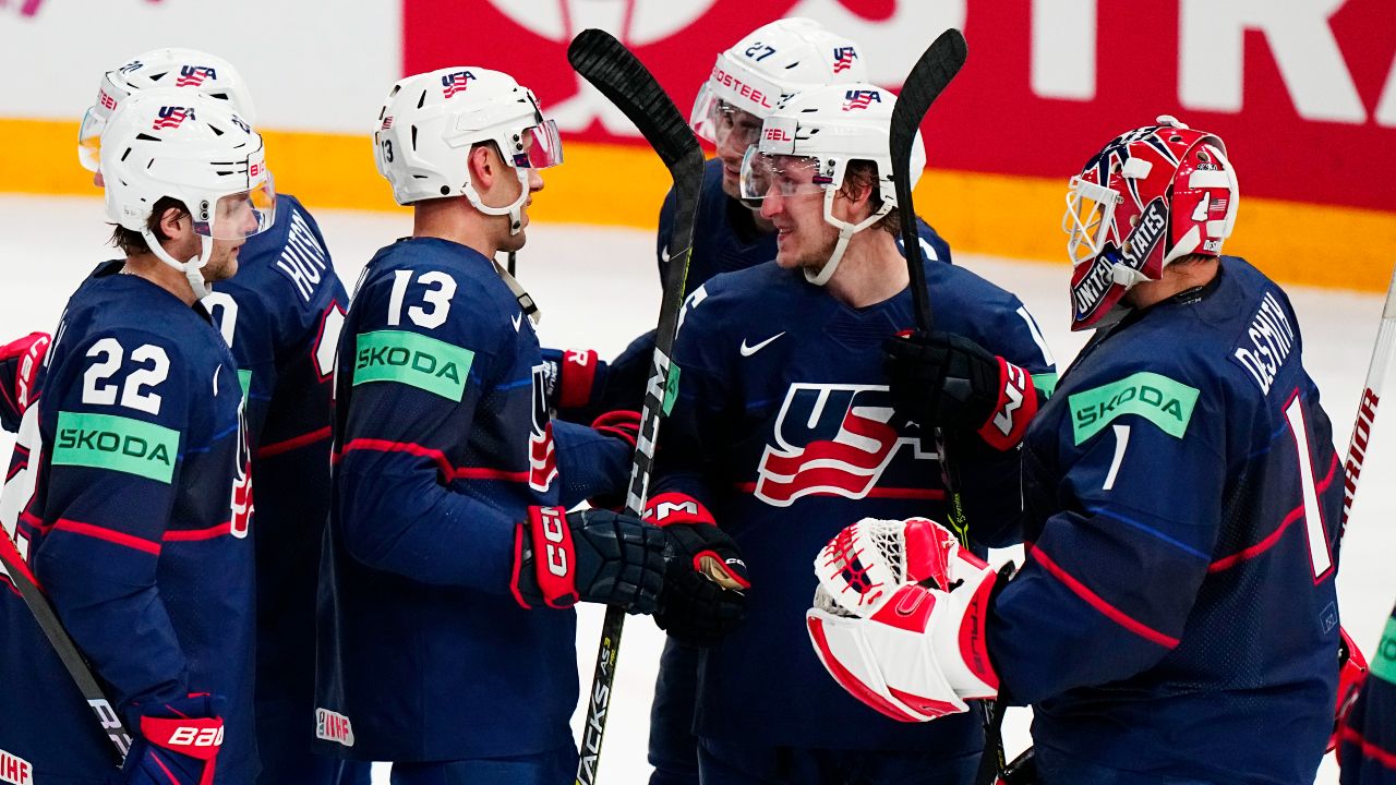 United States Cutter Gauthier, centre, celebrates with teammates