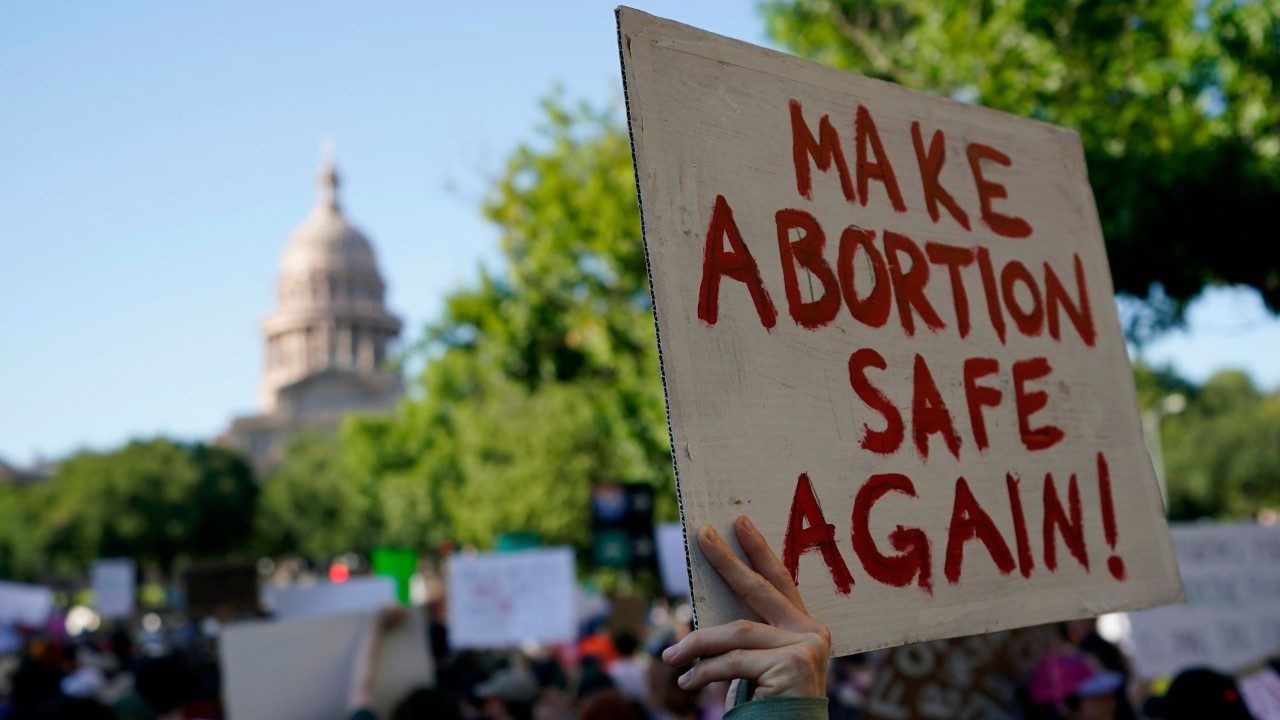 Demonstrators march and gather near the state capitol following the Supreme Court's decision to overturn Roe v. Wade, Friday, June 24, 2022, in Austin, Texas. (AP Photo/Eric Gay)