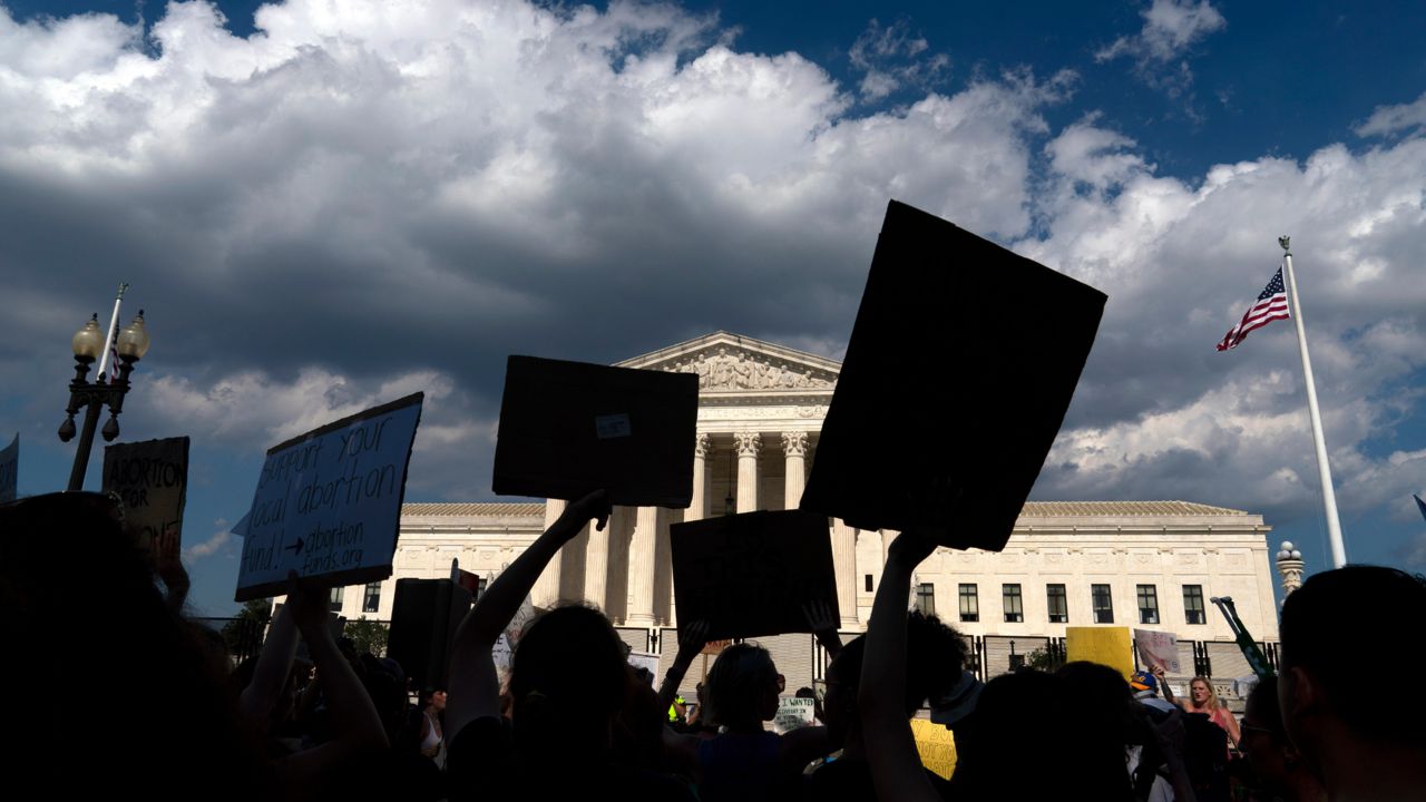 Abortion-rights activists protest outside the Supreme Court in Washington, Saturday, June 25, 2022. Abortion access groups who received a windfall of donations following the Supreme Court's overturning of Roe v. Wade one year ago say those emergency grants have ended and individual and foundation giving has dropped off. (AP Photo/Jose Luis Magana)