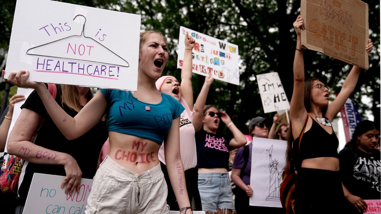 People rally in support of abortion rights, July 2, 2022, in Kansas City, Mo. (AP Photo/Charlie Riedel, File)