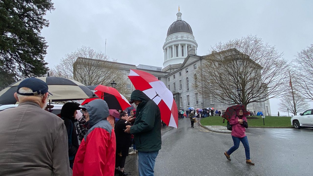 Hundreds of people waited in long lines at the State House Monday to testify on a bill that would allow abortions later in pregnancy. (Susan Cover/Spectrum News)