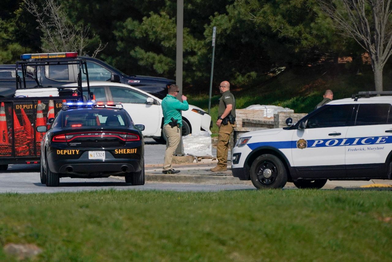 Police: 2 people shot, suspect 'down' in Maryland