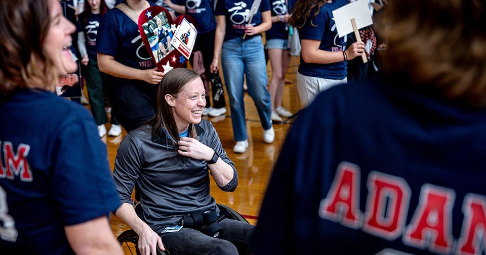 Sarah Adam smiles as she learns that she has become the first woman named to the U.S. Paralympic Wheelchair Rugby Team. (Photo courtesy of SLU)