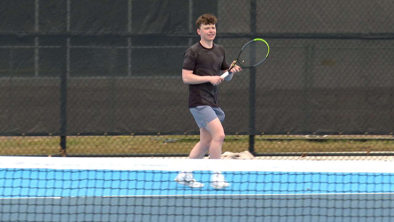Adam Swedlund playing tennis