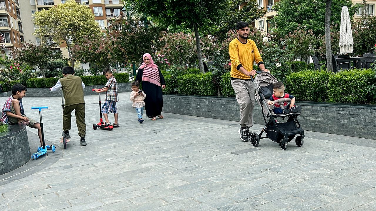 Afghans walk at a tourist resort where they are accommodated, in Shengjin, 44 miles northwest of the capital, Tirana, Albania, Tuesday, June 6, 2023. Hundreds of Afghans are languishing in Albania, waiting for the U.S. visas they were promised, almost two years after fleeing the Taliban takeover of their country. For many, it's an emotional roller coaster. (AP Photo/Llazar Semini)