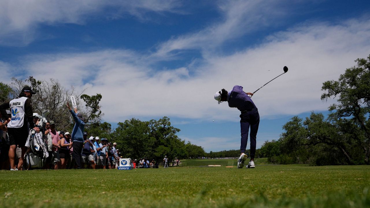 Akshay Bhatia hits his tee shot on the ninth hole during the second round of the Texas Open golf tournament, Friday, April 5, 2024, in San Antonio. (AP Photo/Eric Gay)