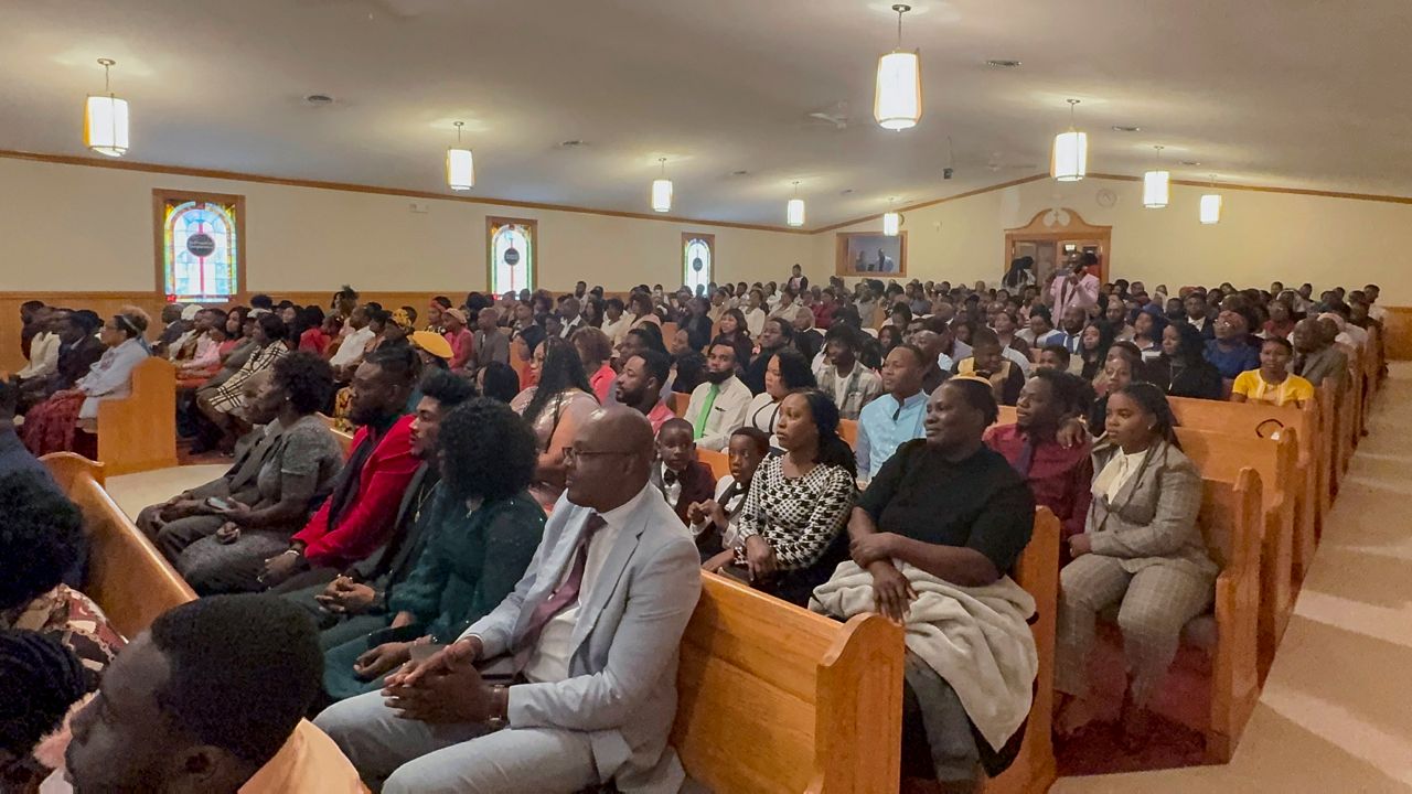 Congregants attend Eglise Porte Etroite, a Creole-language church which has gone from seven attendees to close to 300 in under 15 years, in Albertville, Ala., Sept. 29, 2024. 