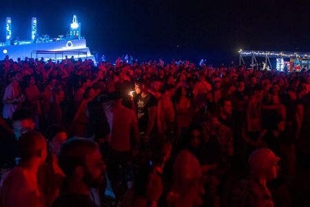 Music fans flock to Albania's beach festival despite virus