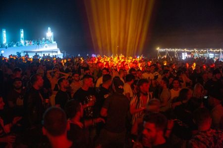 Music fans flock to Albania's beach festival despite virus