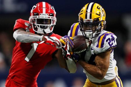 FILE - Ohio State quarterback Justin Fields is sacked by Clemson defensive  lineman Bryan Bresee during the second half of the Sugar Bowl NCAA college  football game in New Orleans, Jan. 1