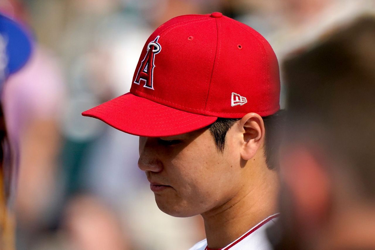 The Latest Ohtani warms up by hitting one into the 3rd deck