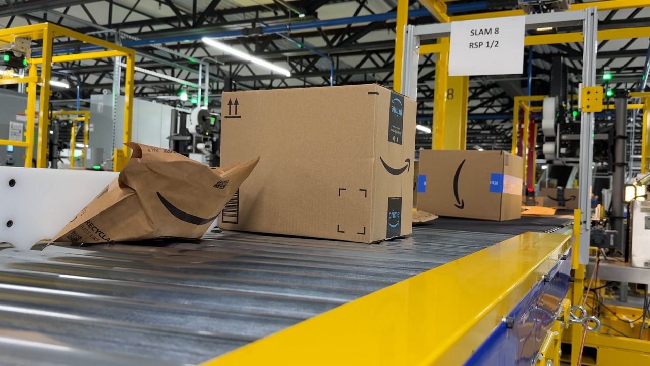 Orders being processed at the Charlton Amazon facility. (Spectrum News 1/Dan Reidy)