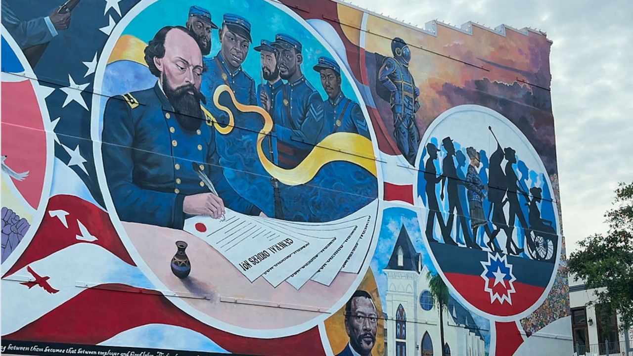 Absolute Equality mural painted outside the Nia Cultural Center in Galveston, Texas. (Spectrum News 1/Amber Hughes)