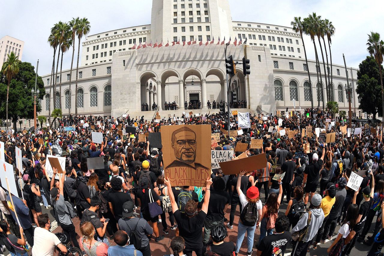 Nation's streets calmest in days, protests largely peaceful