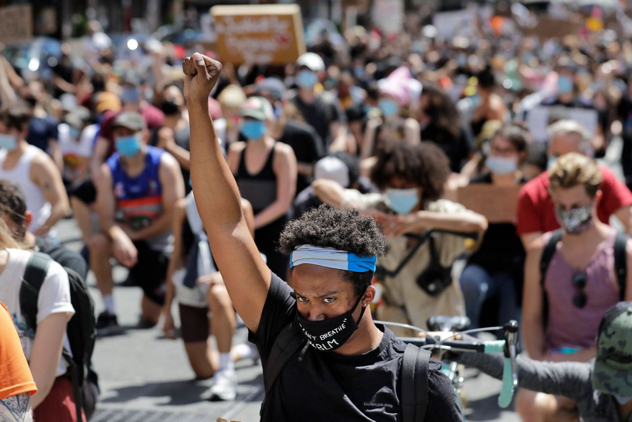 Largely peaceful protests against police brutality march on