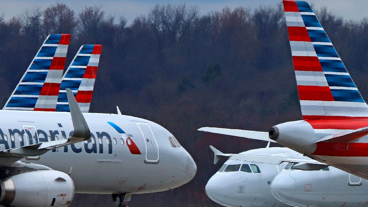 American Airlines planes are parked at Pittsburgh International Airport on March 31, 2020, in Imperial, Pa. 
