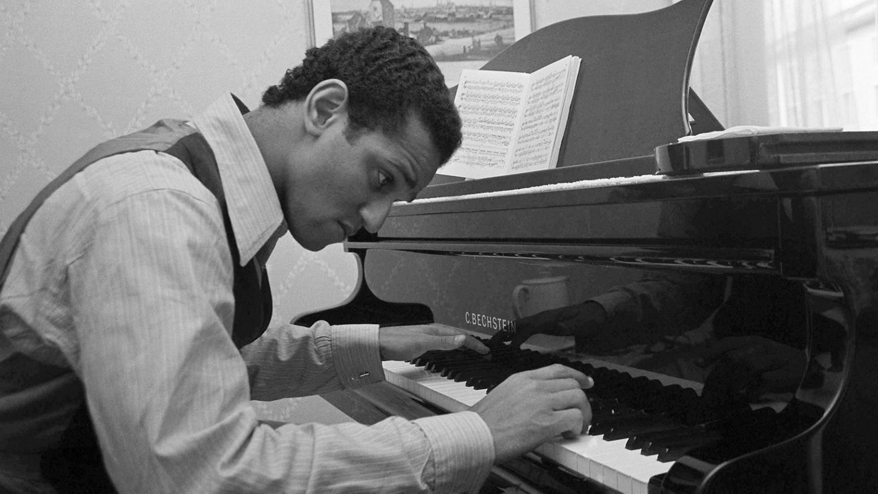 FILE - Andre Watts, 16, performs the Liszt piano concerto No. 1 with the New York Philharmonic, on Jan. 31, 1963. Watts died Wednesday, July 12, 2023 in Bloomington, Ind., at age 77. (AP Photo/Matty Zimmerman, File)