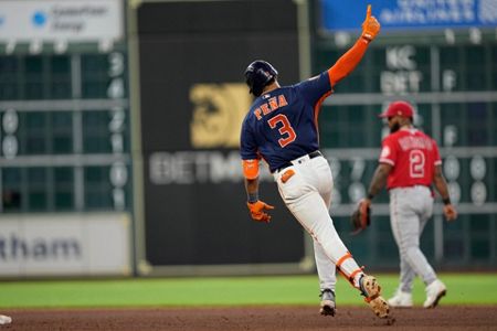 Houston Astros relief pitcher Parker Mushinski looks in at the