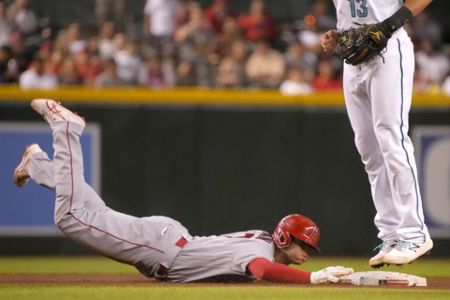 Ohtani delivers on mound, at plate as Angels top D-backs 6-5