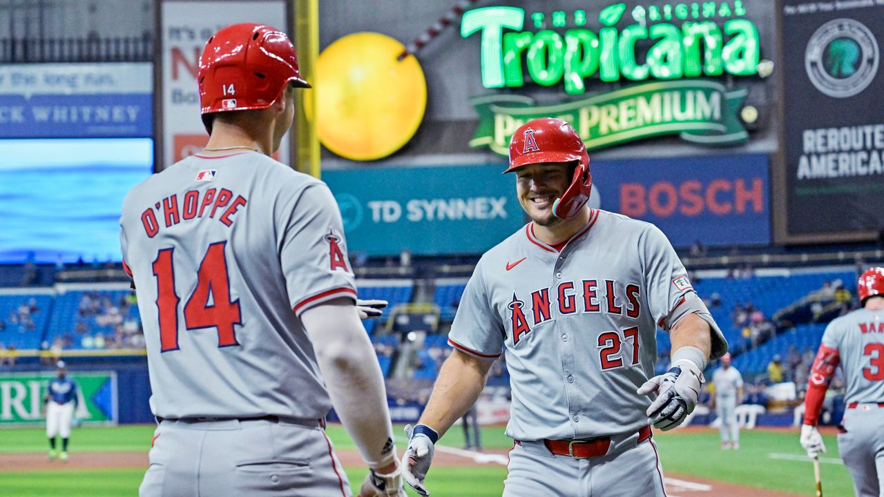 Los Angeles Angels' Logan O'Hoppe (14) greets Mike Trout (27) after Trout's solo home run off Tampa Bay Rays starter Zack Littell during the first inning of a baseball game Wednesday, April 17, 2024, in St. Petersburg, Fla. (AP Photo/Steve Nesius)