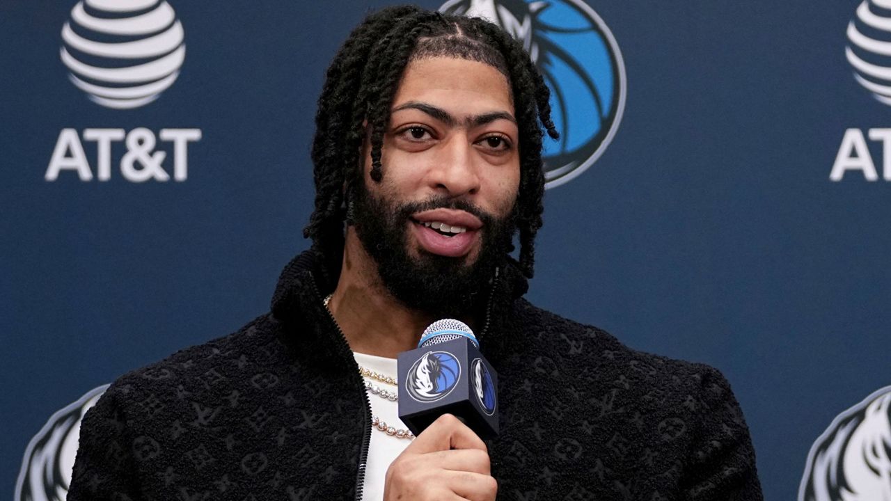 Newly acquired Dallas Mavericks players Anthony Davis responds to a question during a news conference at the NBA basketball team's practice facility in Dallas, Friday, Feb. 7, 2025. (AP Photo/Tony Gutierrez)