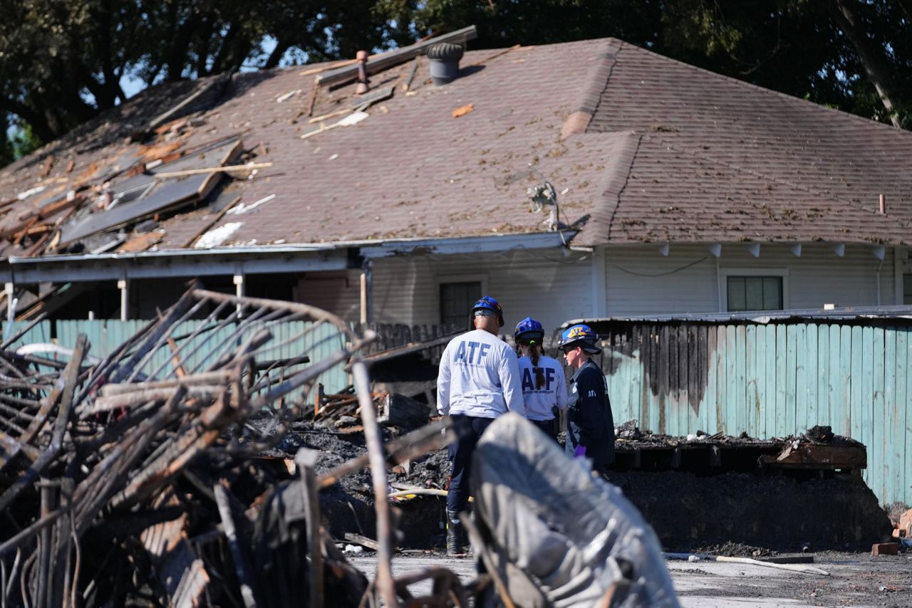 Crews scour the site of a deadly Dallas apartment blast and fire ...