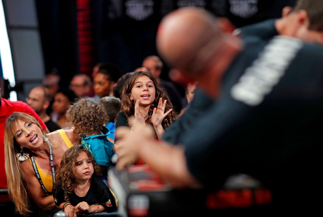 Arm wrestling looks to climb beyond barroom bragging rights