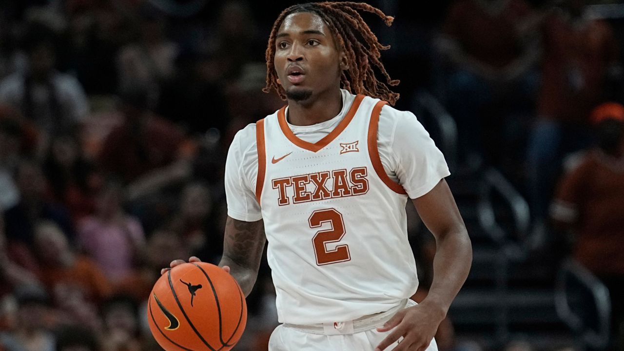 Texas guard Arterio Morris brings the ball up during the second half of the team's NCAA college basketball game against Arkansas-Pine Bluff in Austin, Texas, Dec. 10, 2022. (AP Photo/Eric Gay)