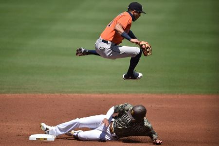 Tatis' stellar catch, Machado HR lift Padres over Astros 5-3 – KXAN Austin